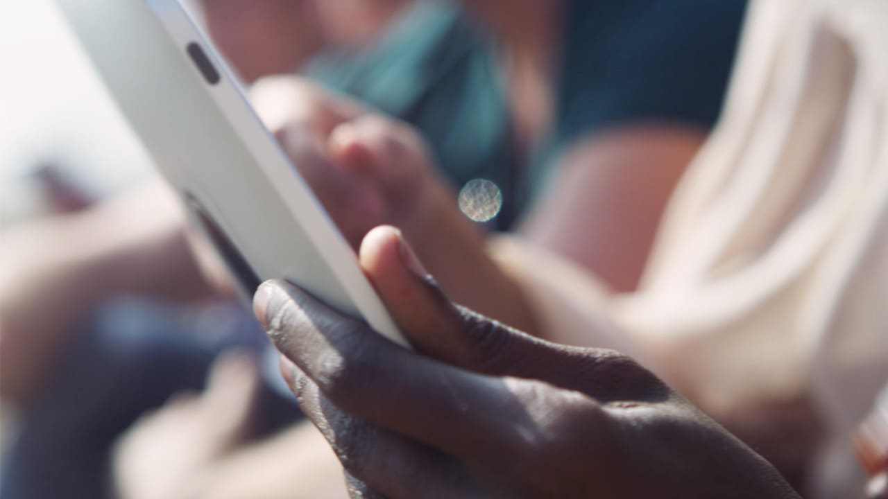 Person holding tablet